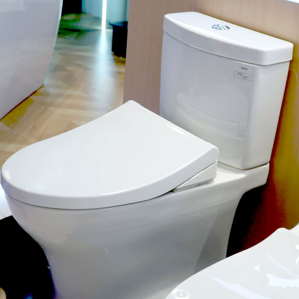Bàn cầu 2 khối TOTO CS769DRE4#XW nắp rửa cơ TCW1211A