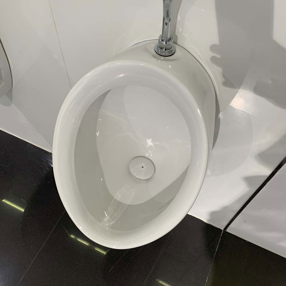 Bồn tiểu nam TOTO U104W/F#W DU601SRR treo tường kèm van xả nhấn