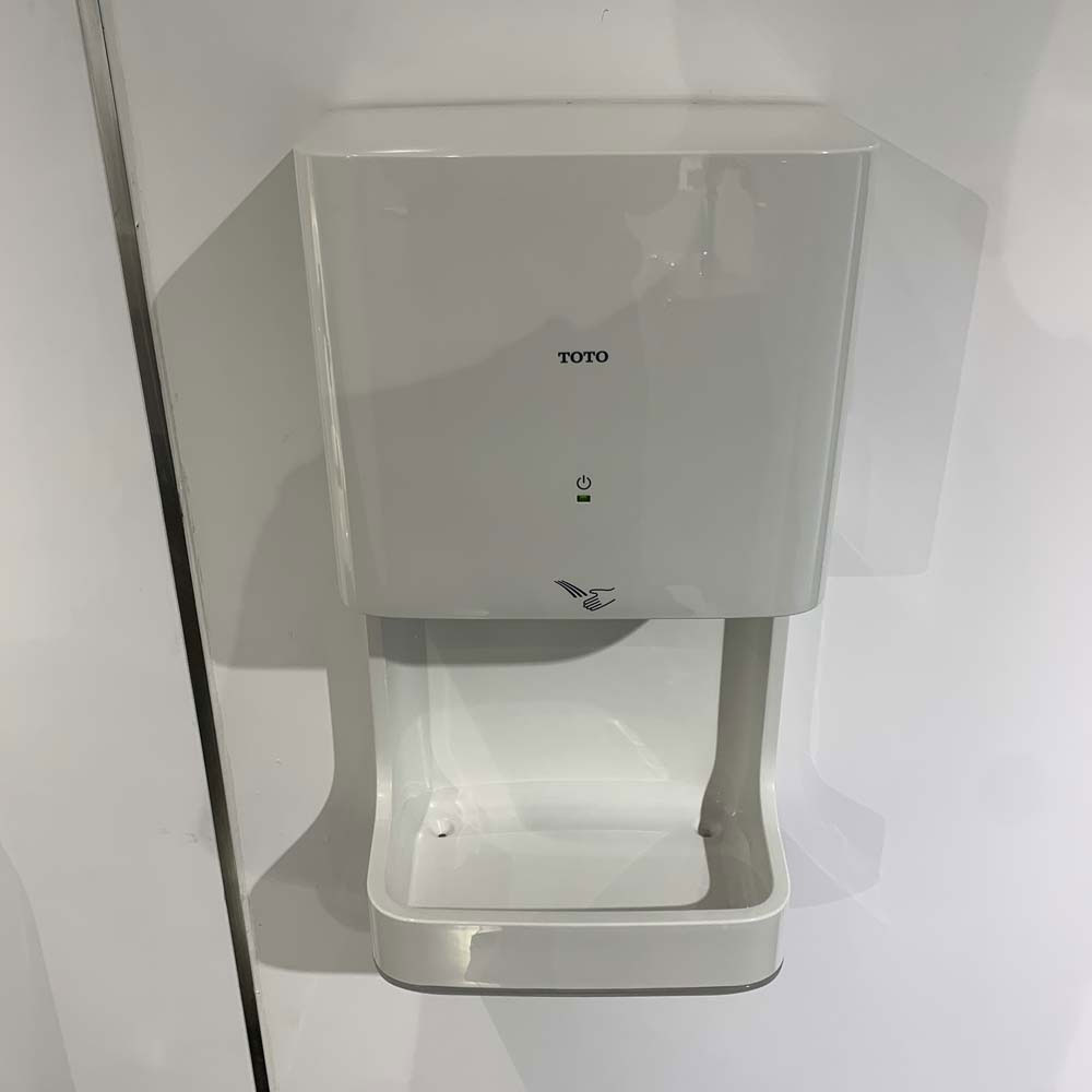 Máy sấy tay TOTO TYC322W có khay hứng nước